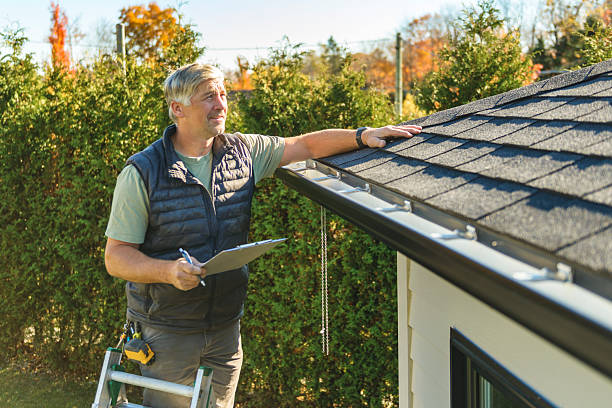 Professional Roofing technician working in Springfield, MI